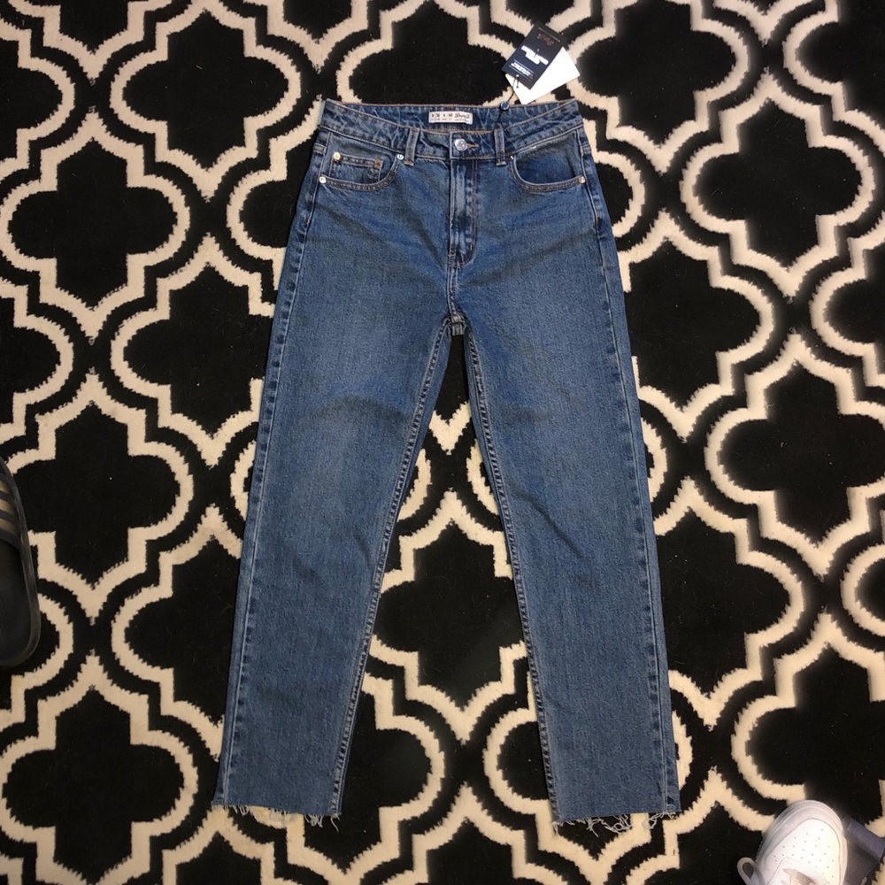 distressed ankle length mom jeans